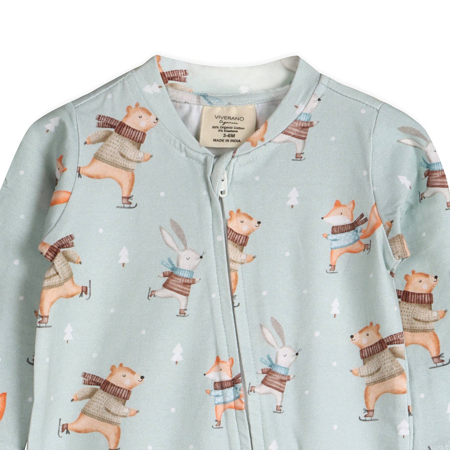 Children's onesie with animal pattern on a light blue background