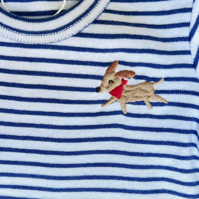 Striped shirt with embroidered dog design on a hanger