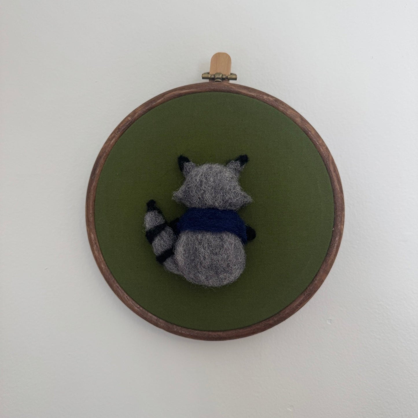 Needle Felted Raccoon with Blue Scarf on Green Background - Hanging Wall Decor - Bossy Beans