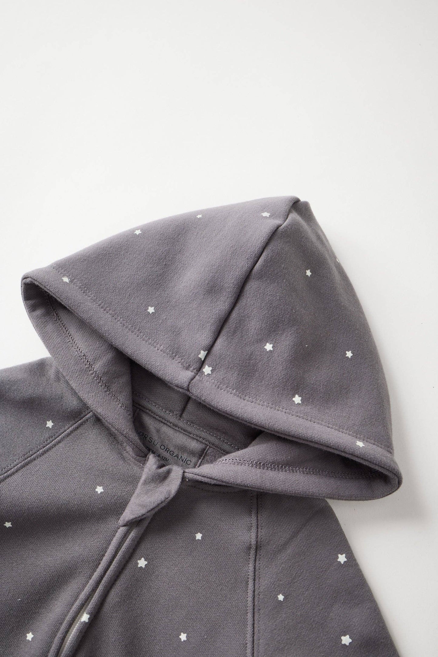 Gray hoodie with star patterns on a white background