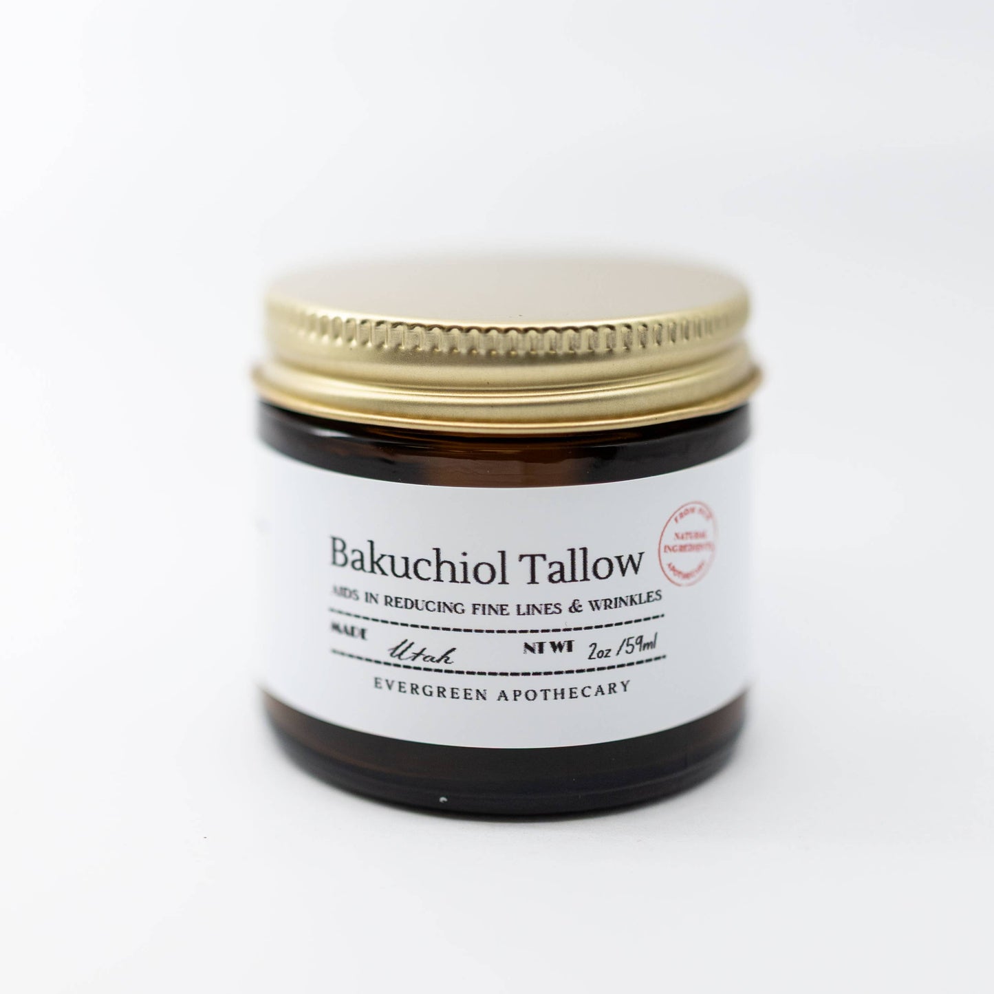 Jar of Bakuchiol Tallow with gold lid on a white background
