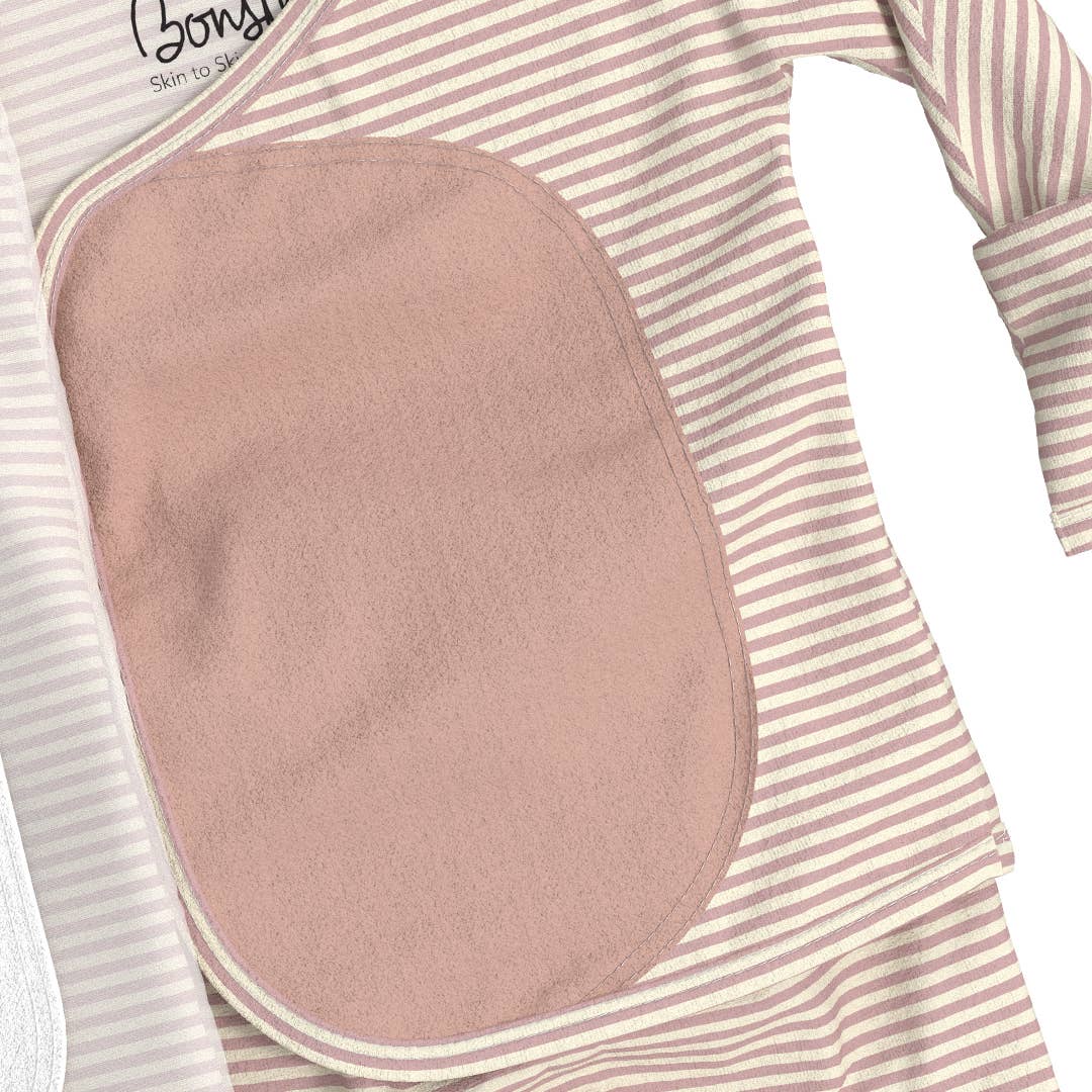 Baby outfit with pink bib and striped sleeves on a white background