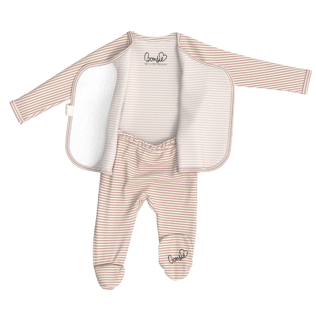 Baby outfit with striped shirt and pants on a white background