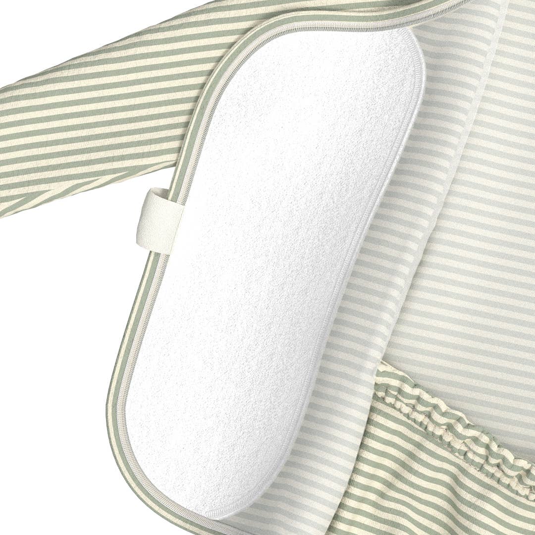Close-up of a white pillow with a green and white striped cover on a white background