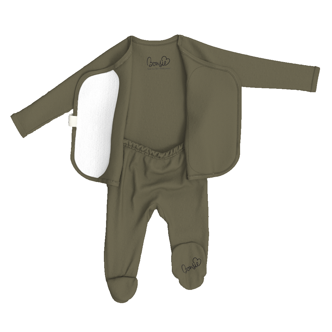 An olive green baby footed sleeper set with an integrated long-sleeve hood and a white reversible fleece lining, shown against a plain white background.