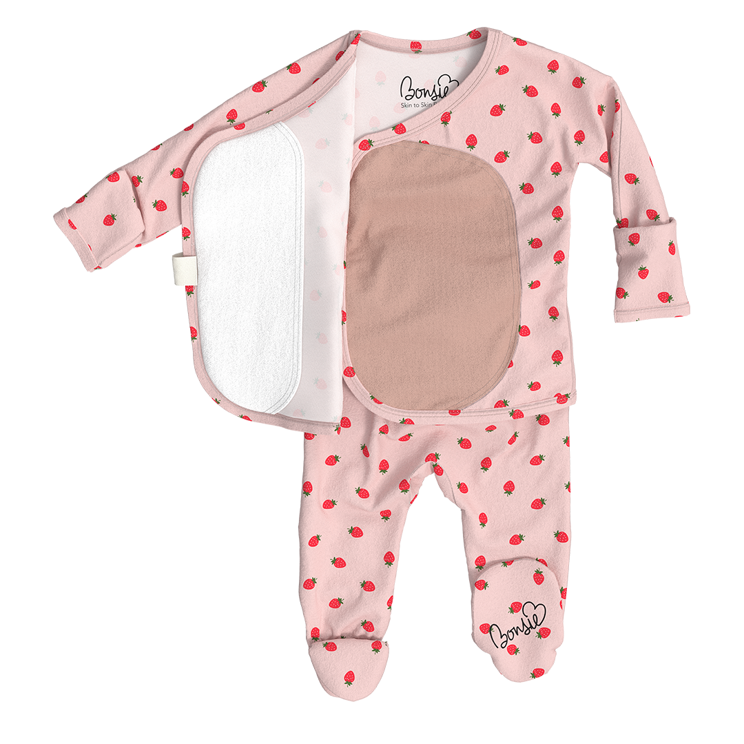 Baby onesie with strawberry pattern on a white background