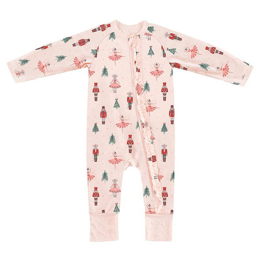 Baby onesie with Christmas-themed print on a white background