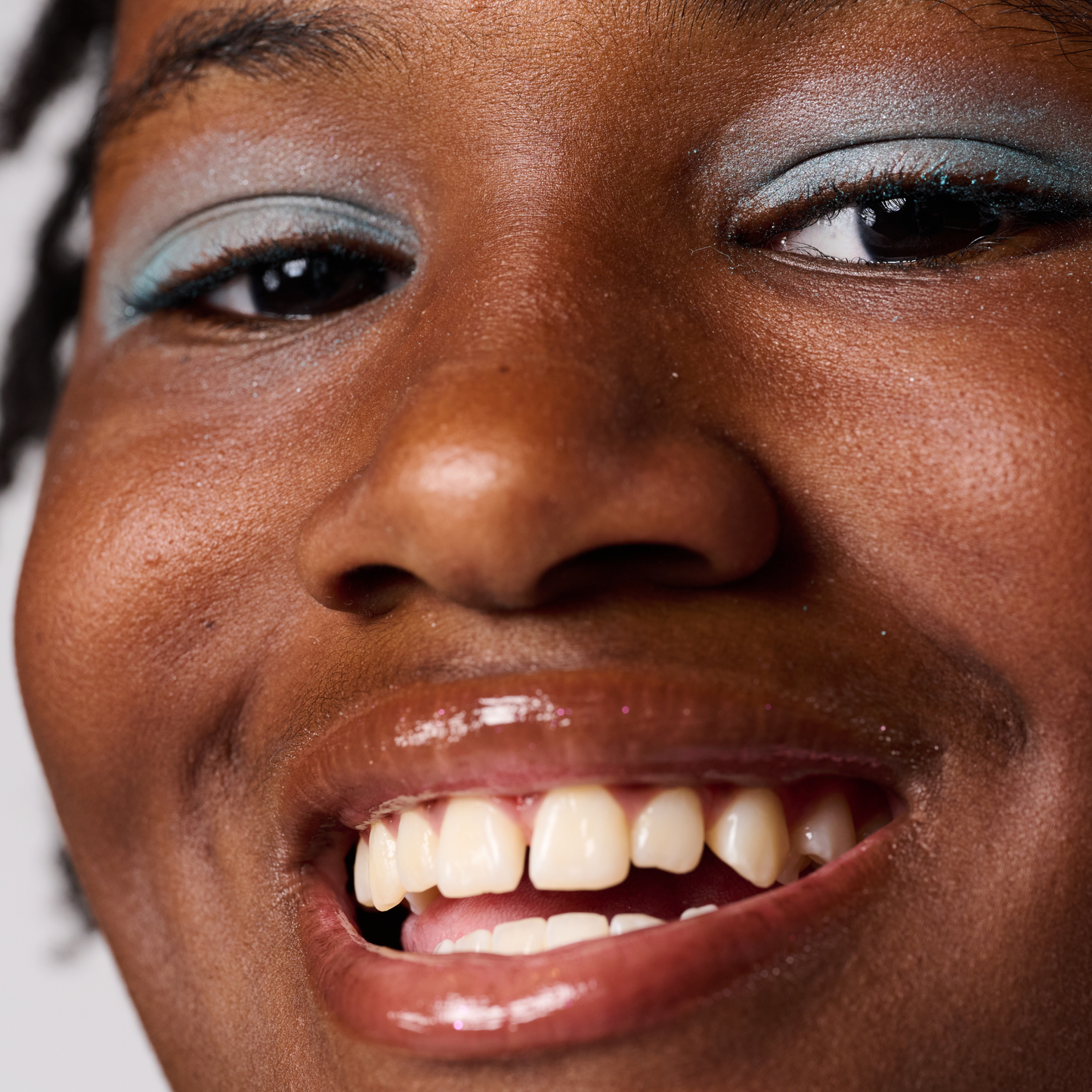 Close-up of a woman's face with a neutral expression