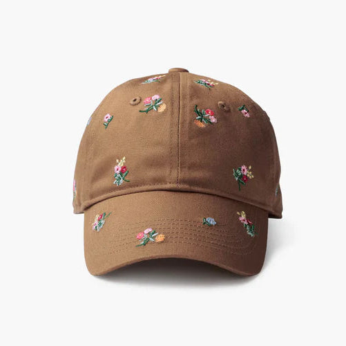 Brown cap with floral embroidery on a white background