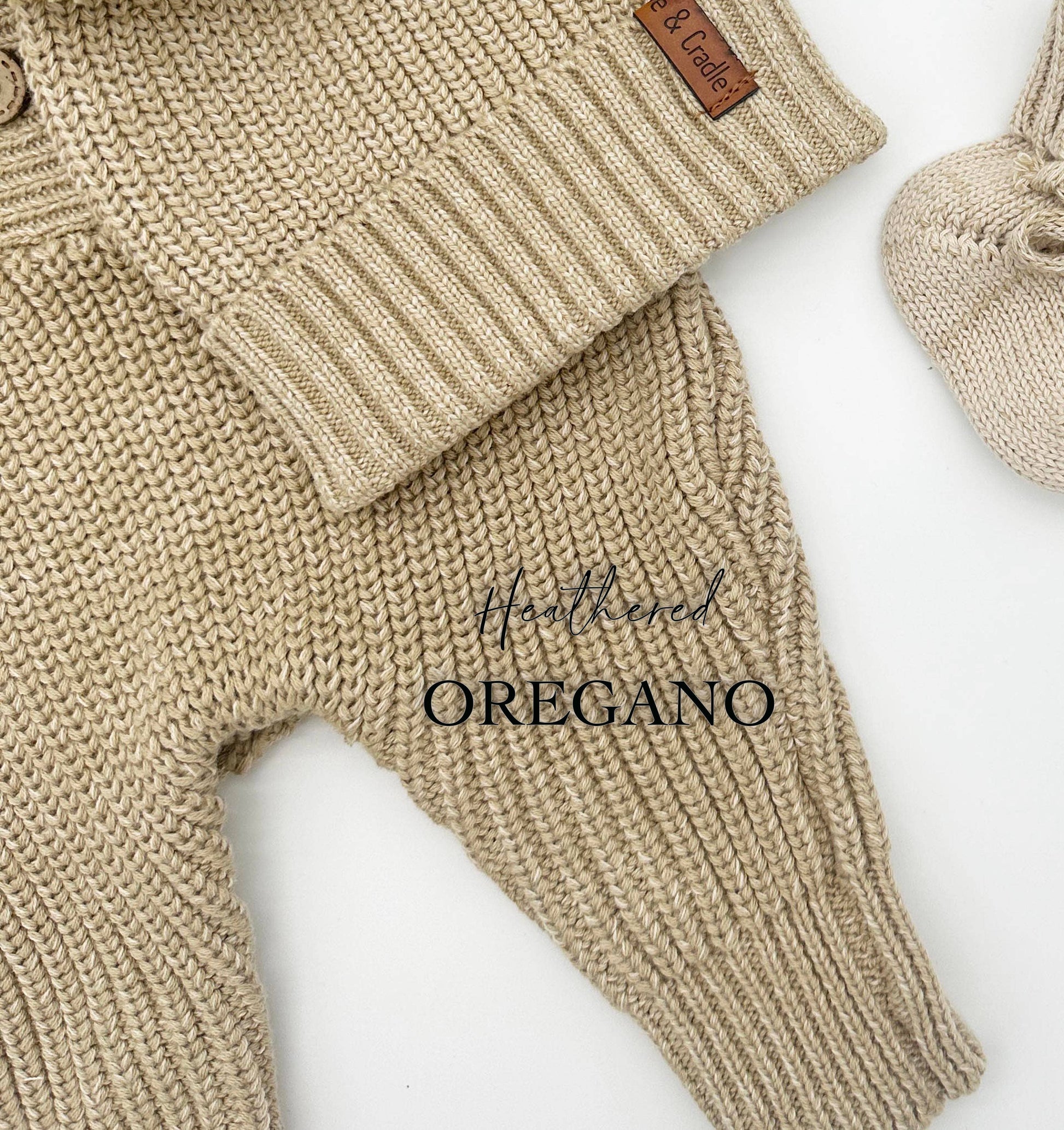 Knitted beige baby outfit with matching hat on a white background, featuring the brand 'B & Co.'