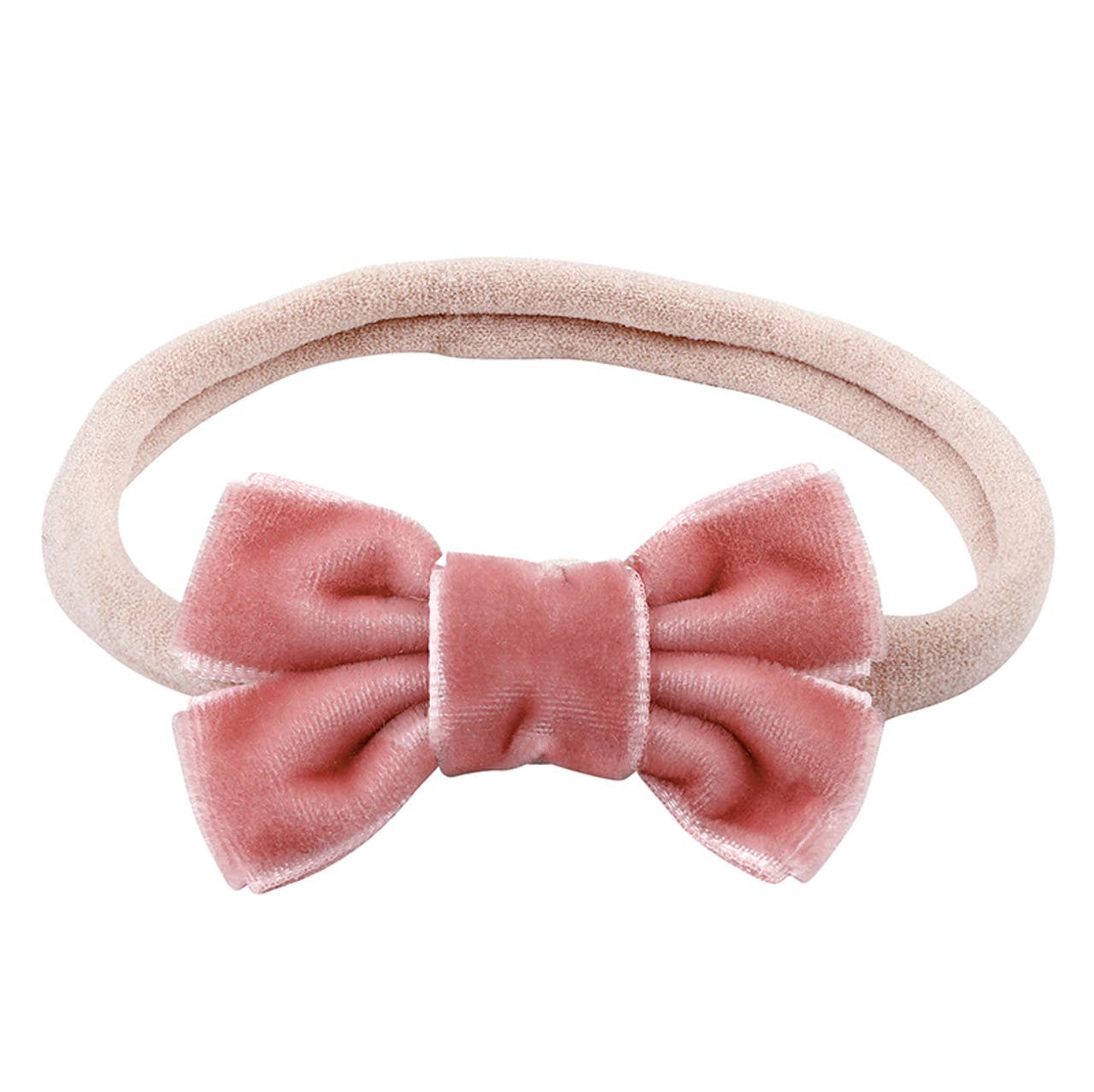 Pink velvet bow hairband on a white background