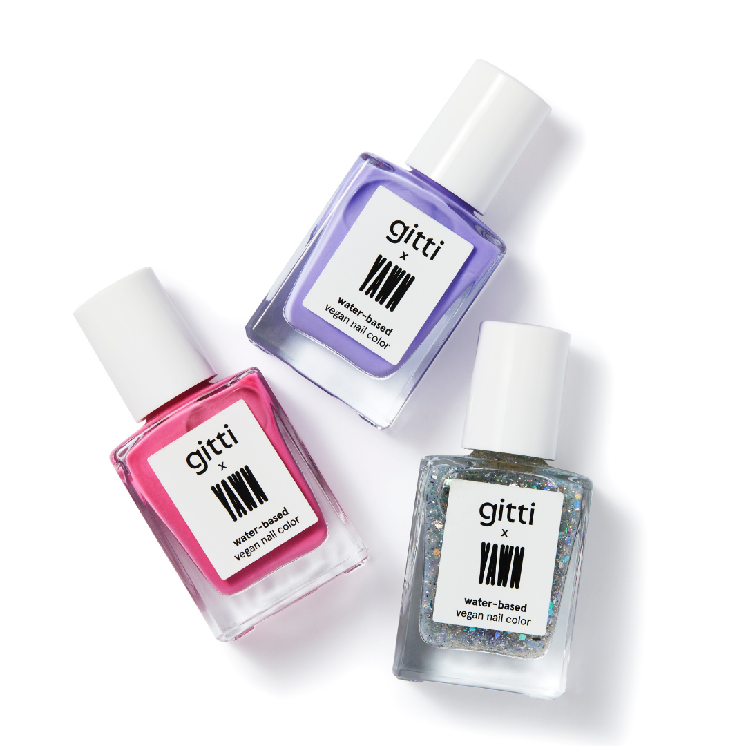 Three bottles of gitti vegan nail color on a white background