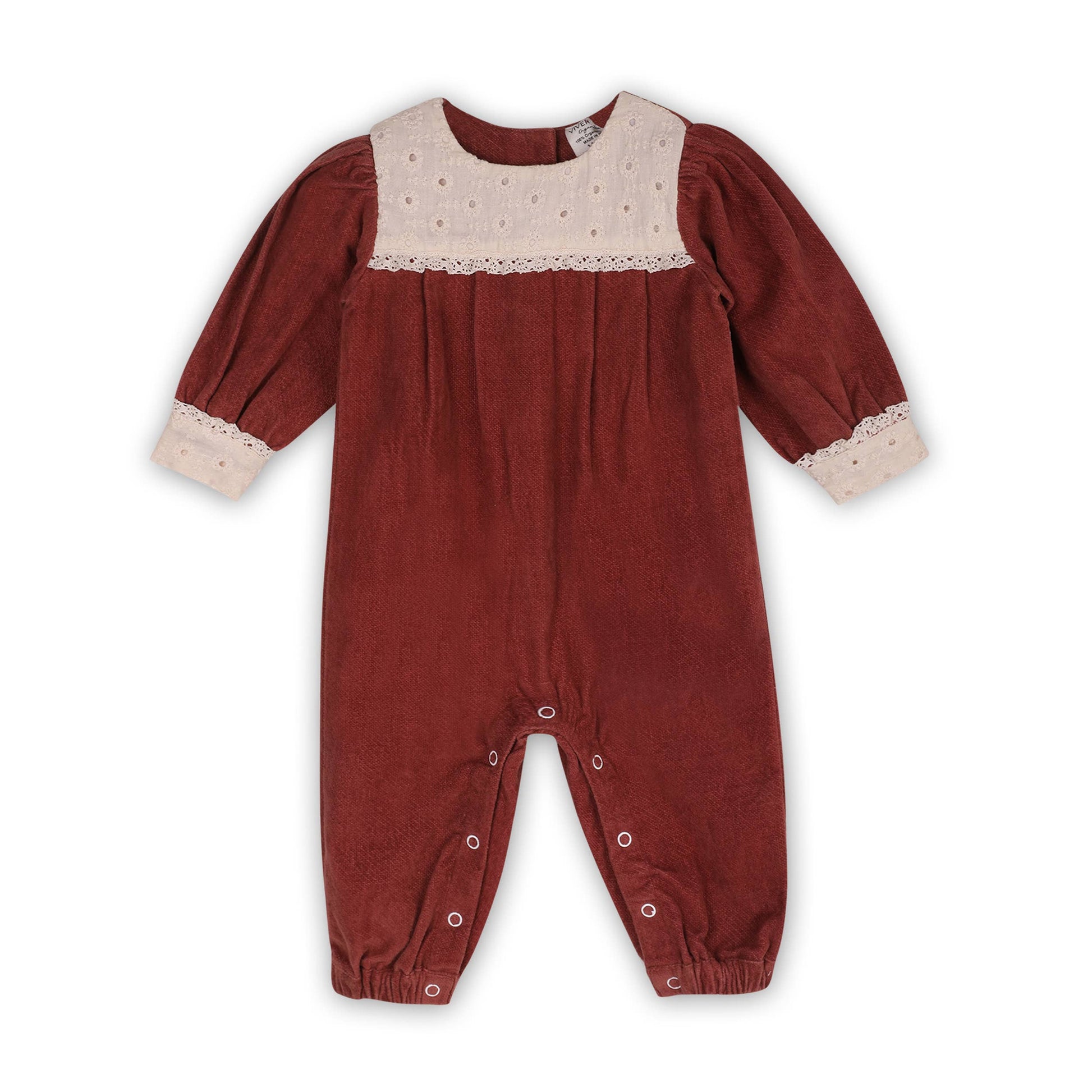 Red baby romper with lace details on a white background