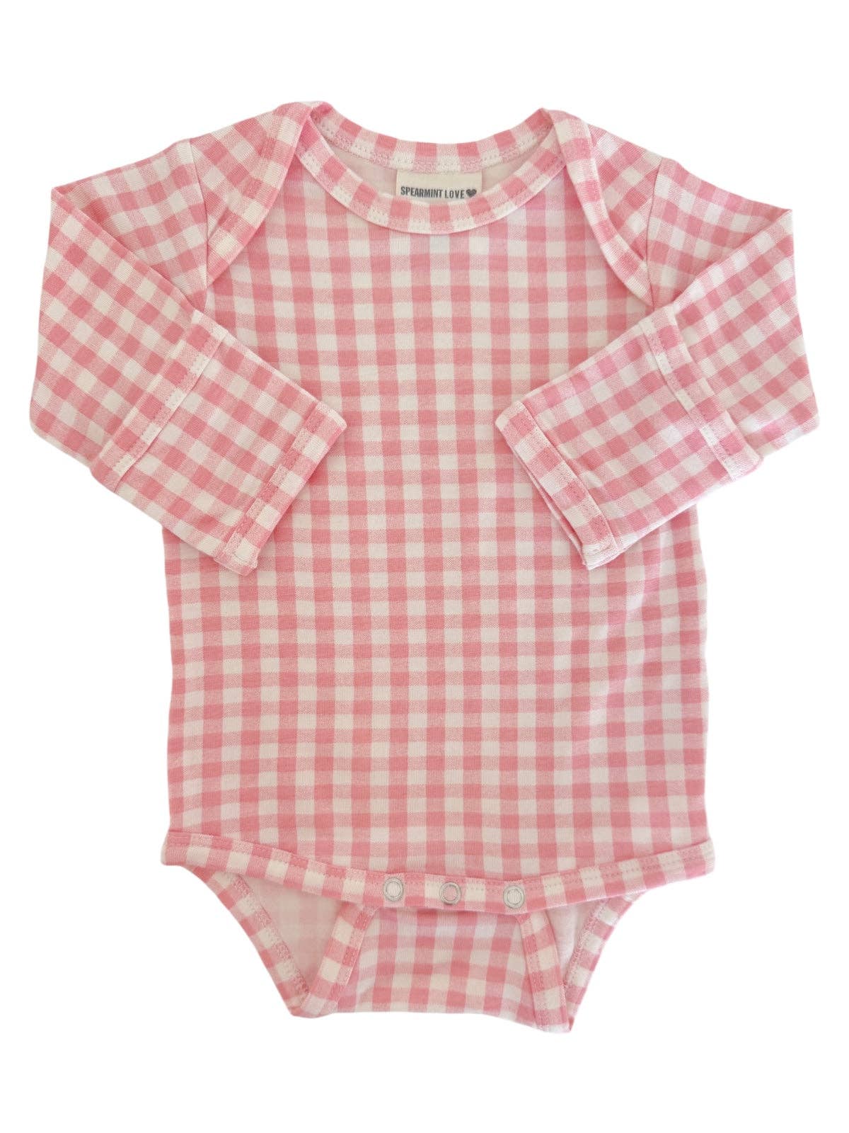 Pink and white checkered baby onesie on a white background