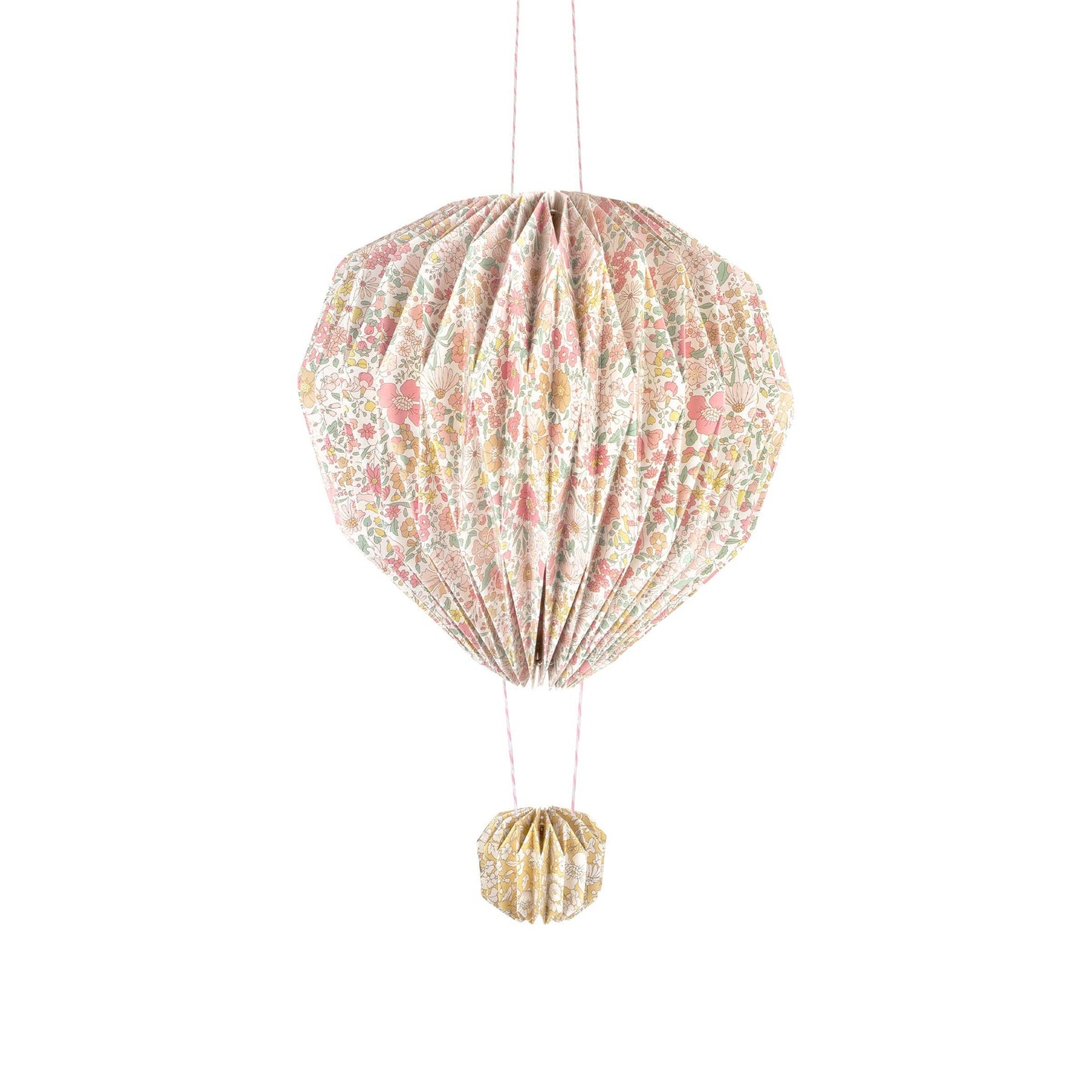 Decorative hot air balloon with floral pattern on a white background