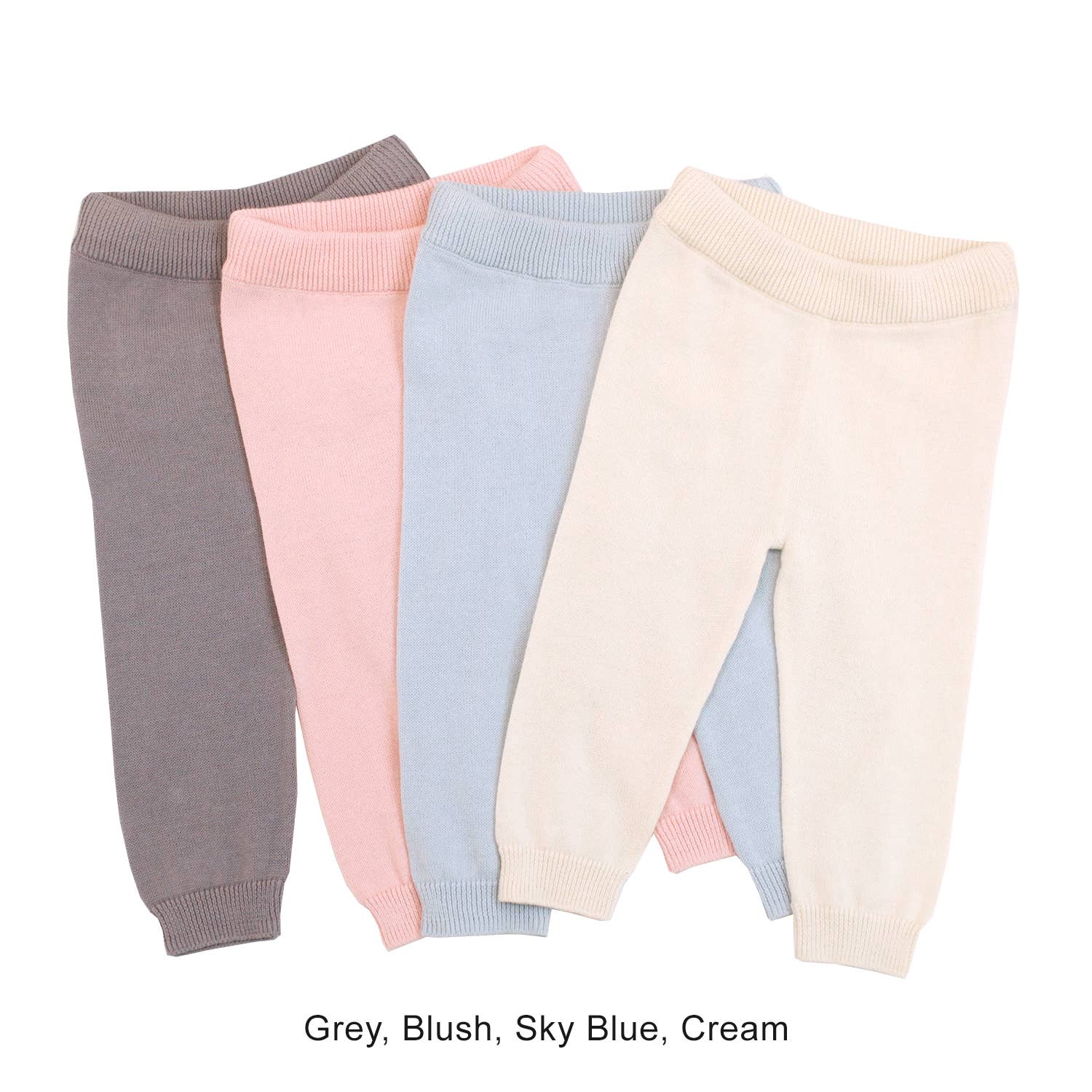 Four pairs of baby leggings in different colors on a white background