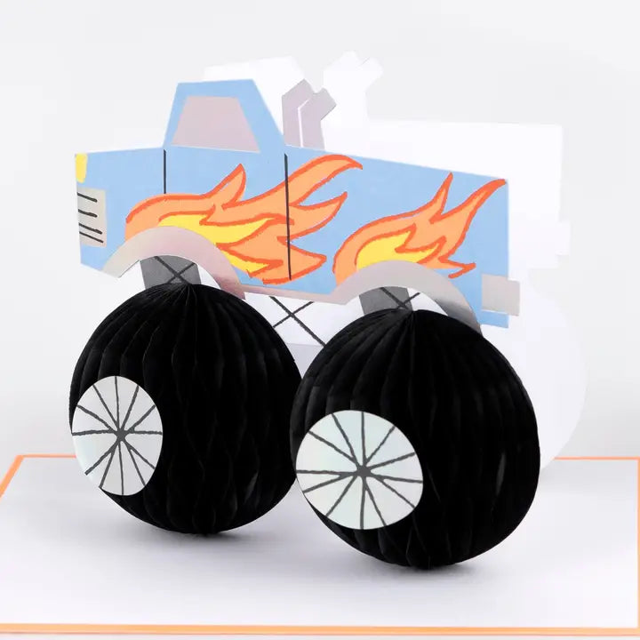 Toy car model with flames on a white background