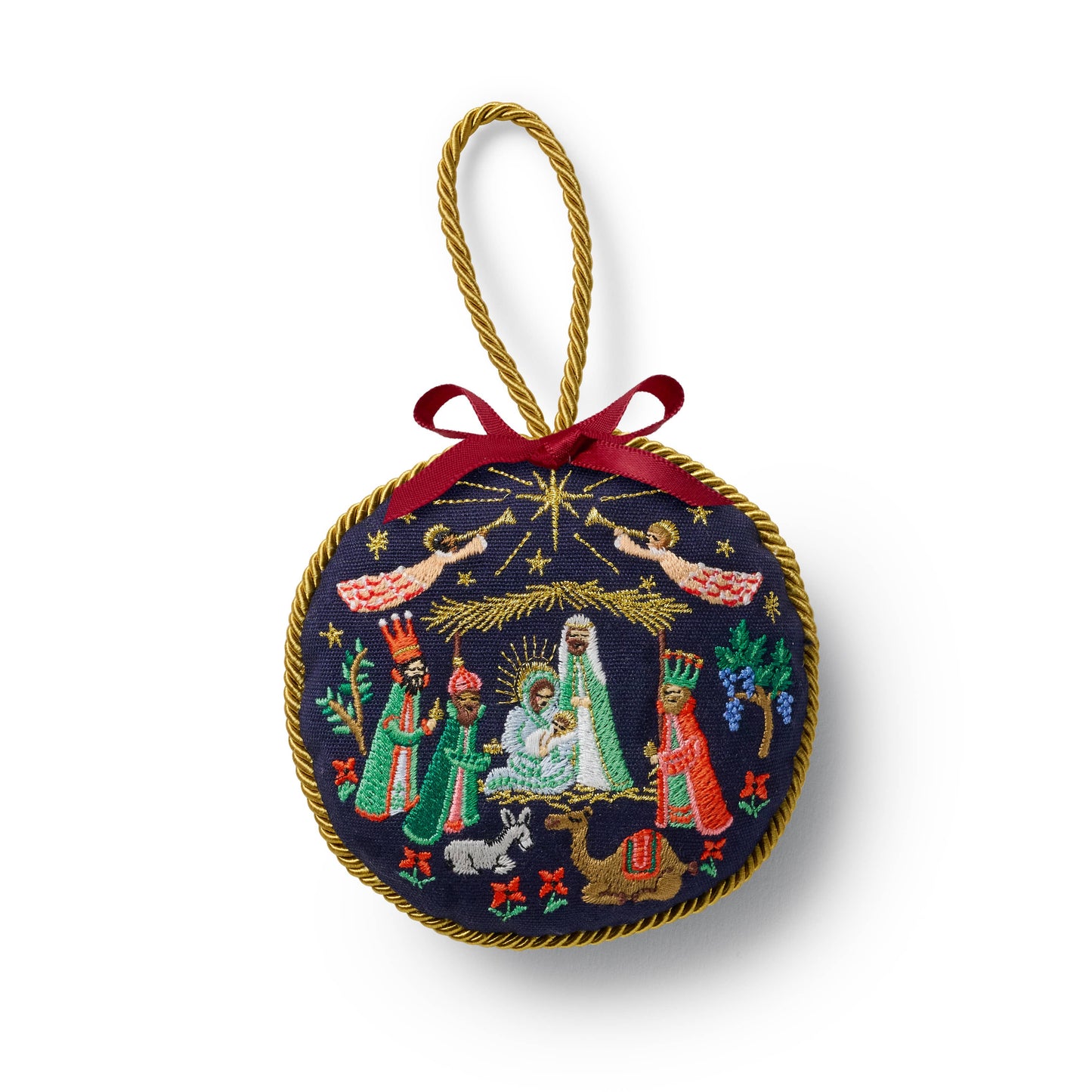 Embroidered Christmas ornament with nativity scene design on a white background