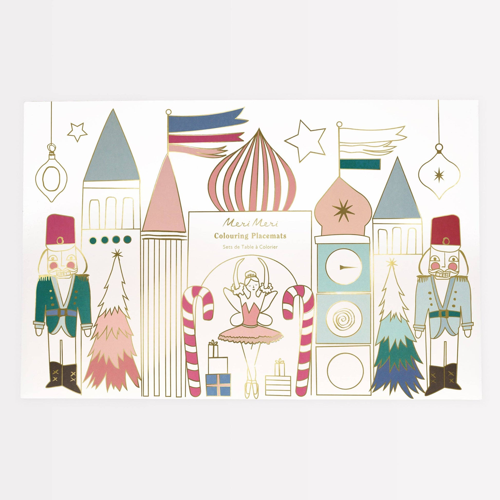 Decorative paper with festive illustrations including nutcrackers, candy canes, and a clock tower on a white background.
