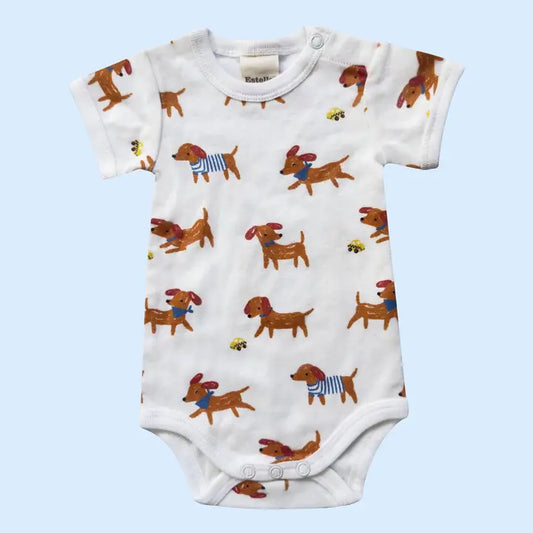 Baby onesie with dachshund pattern on a light blue background