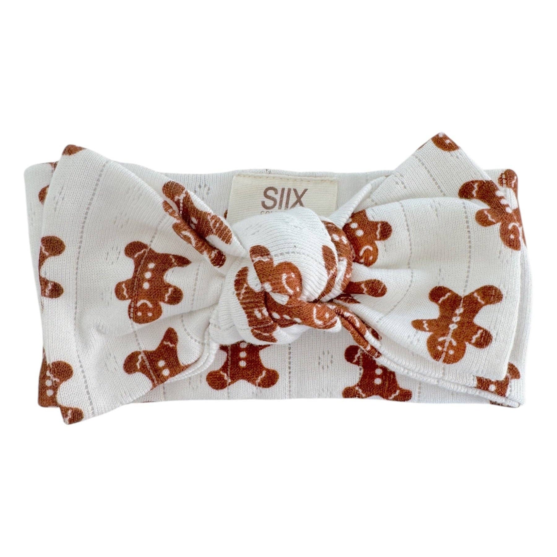 Headband with gingerbread man pattern on a white background