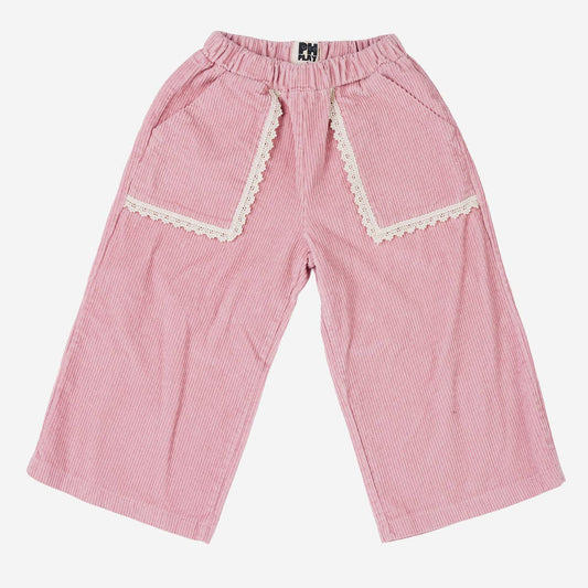 Pink pinstriped cropped pants with decorative cream lace trim along the pocket edges, featuring an elastic waistband.