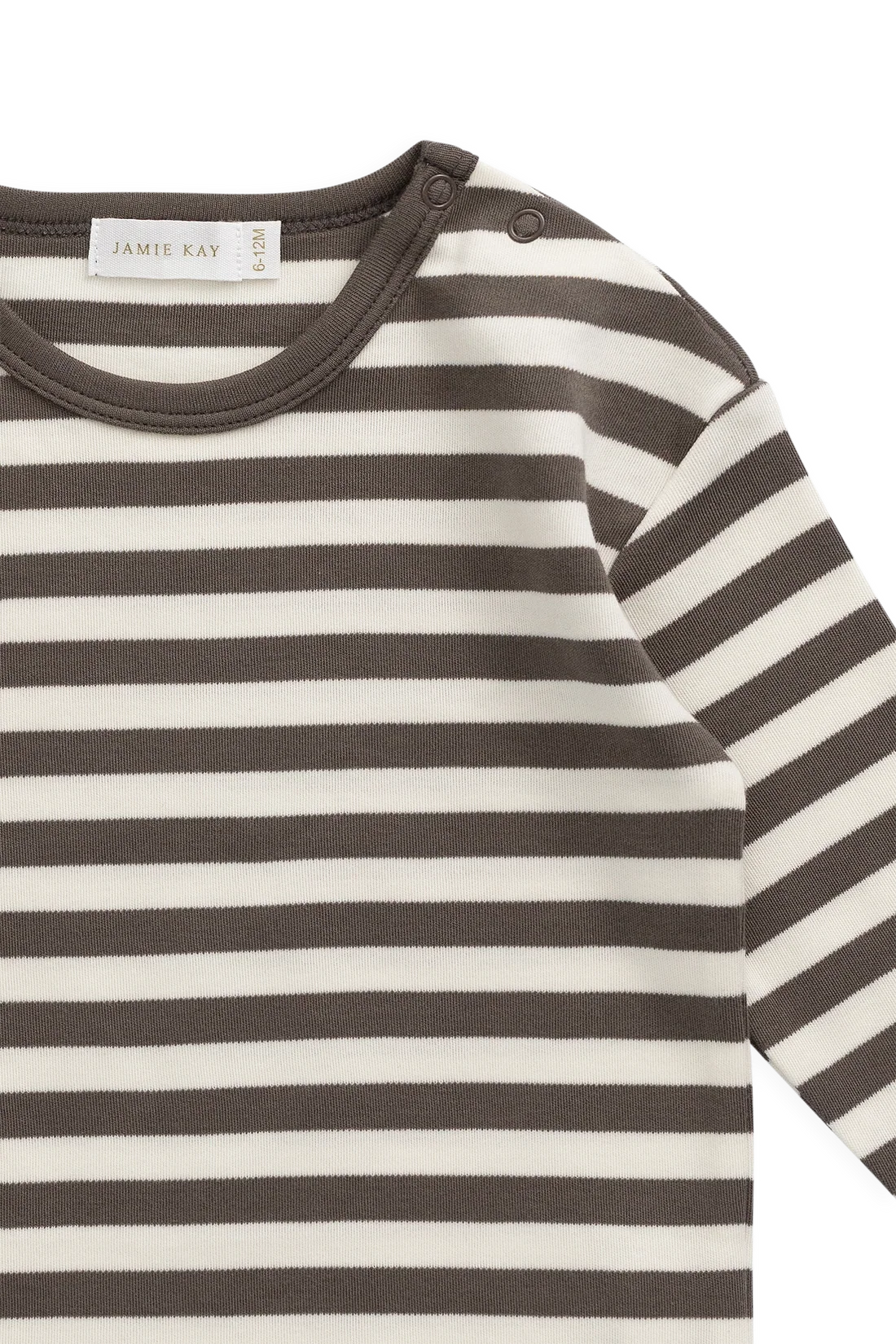 Close-up of a Jamie Kay baby long-sleeve top with dark brown and off-white horizontal stripes, featuring a crew neck and shoulder snap buttons.