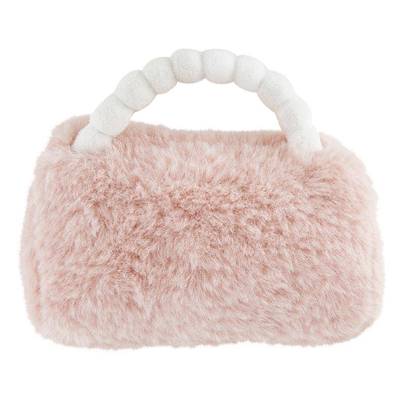 Pink fluffy handbag with white handle on a white background