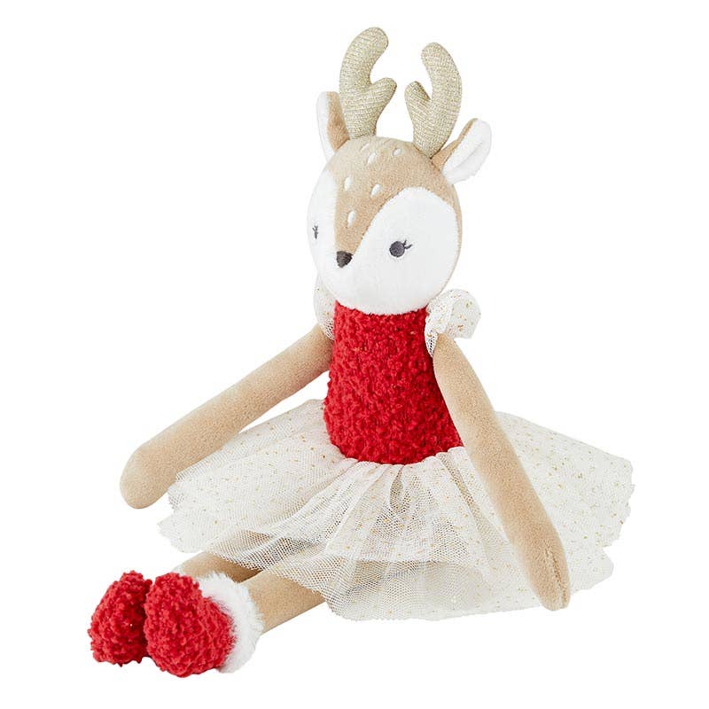 Toy deer in a red dress with a white skirt on a white background