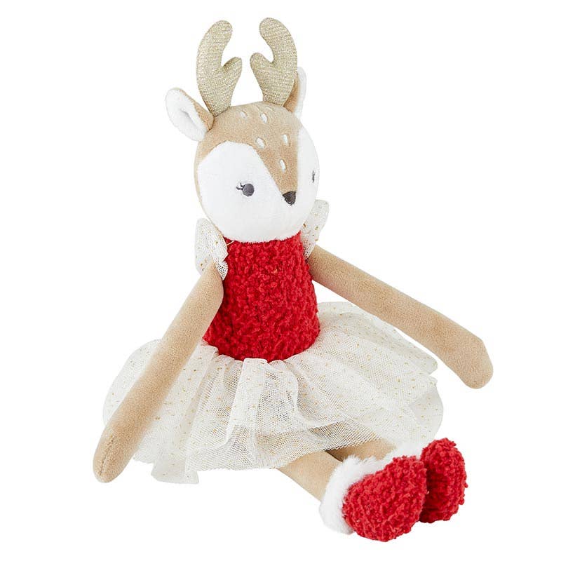 Toy deer with a red sweater and white skirt on a white background