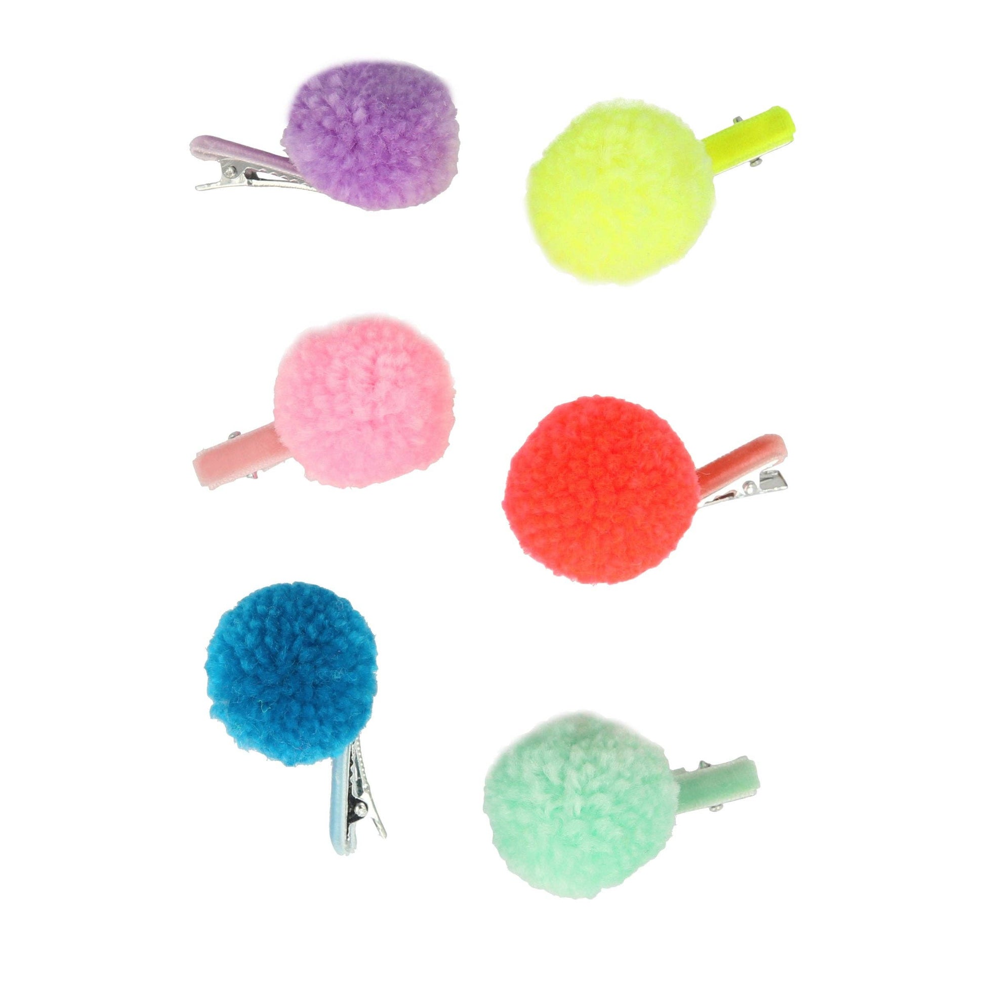 Set of colorful pom-pom hair clips on a white background