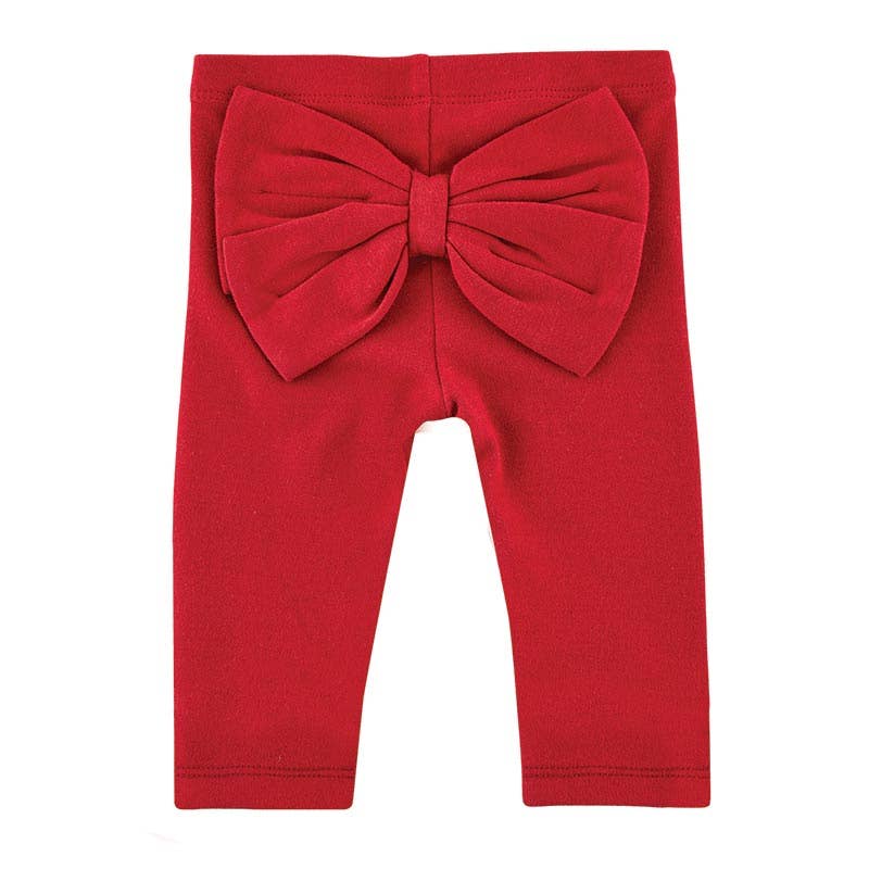 Red leggings with a large bow on a white background