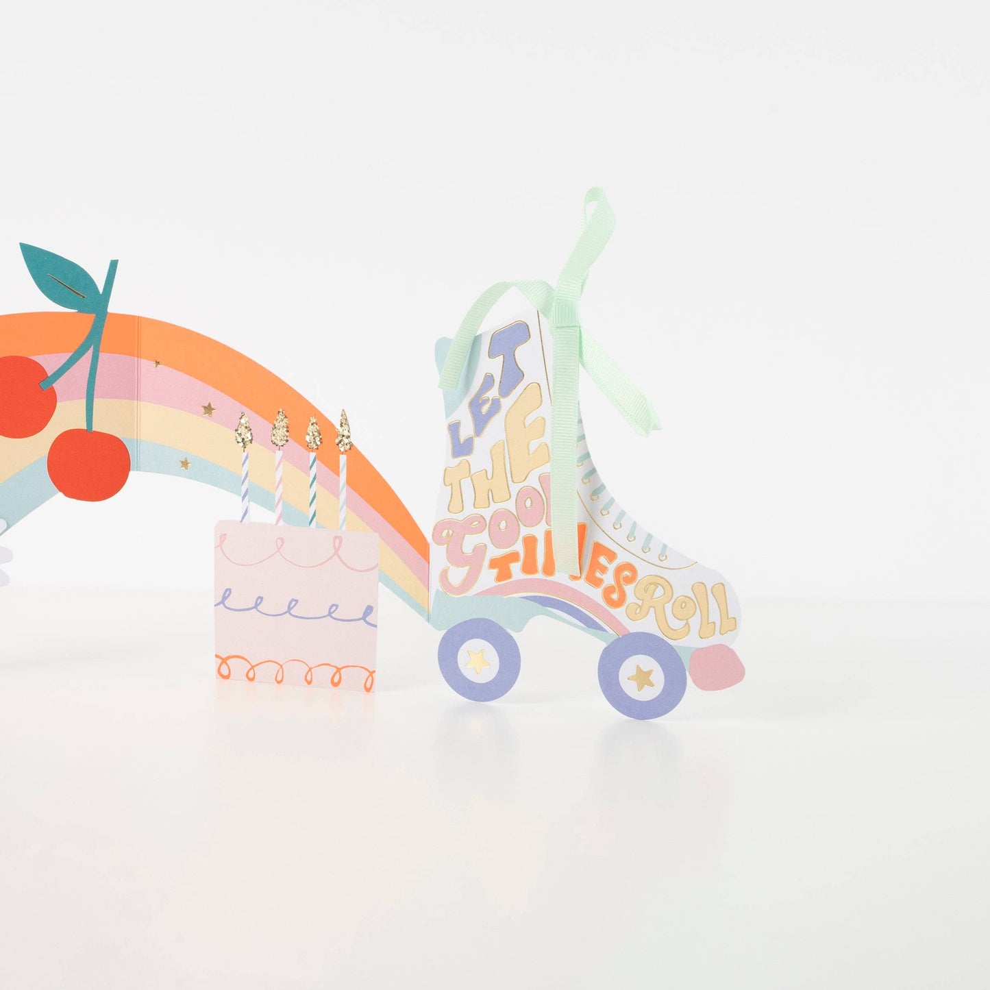 Colorful illustration of a rainbow, cherries, and a cloud with text on a white background