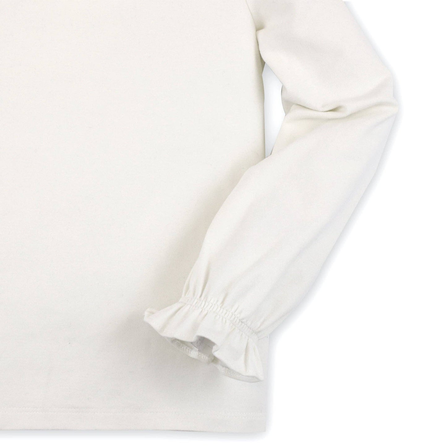 Close-up of a white long-sleeve shirt on a light gray background