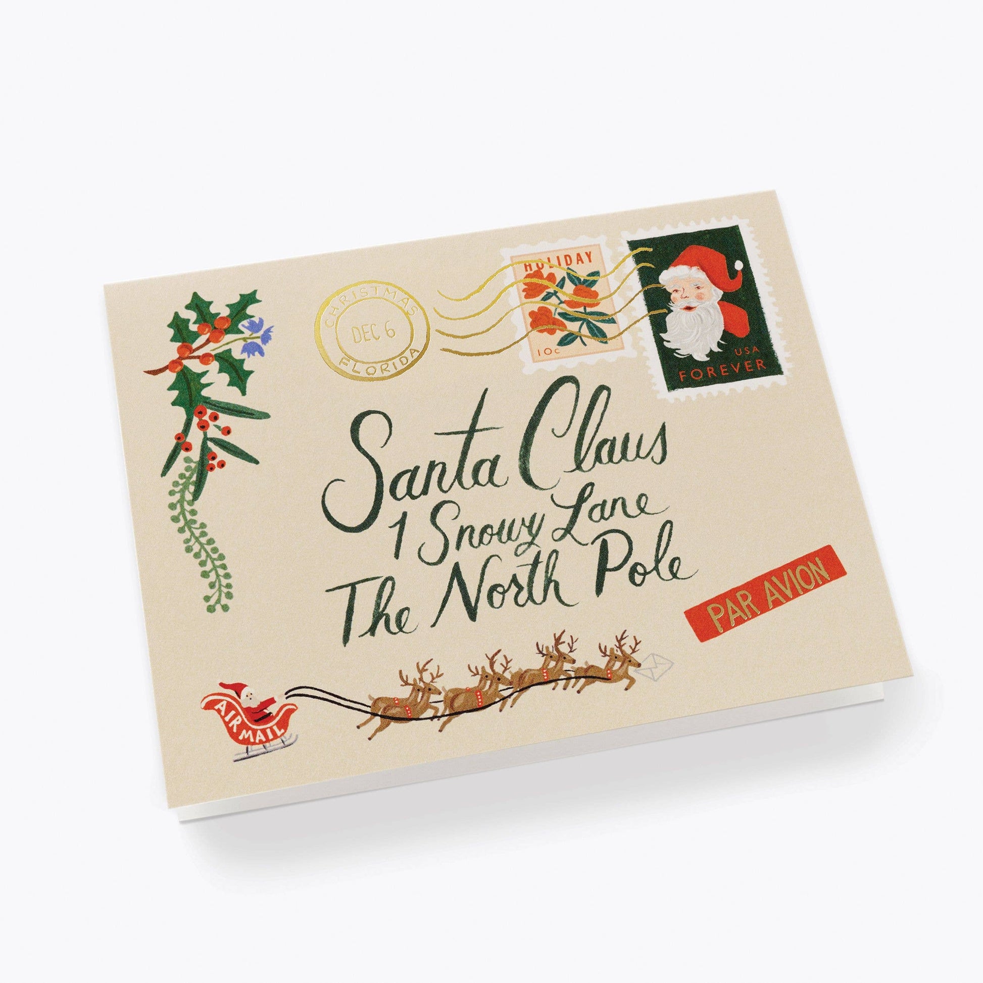 Decorative envelope with Santa Claus and North Pole text on a white background