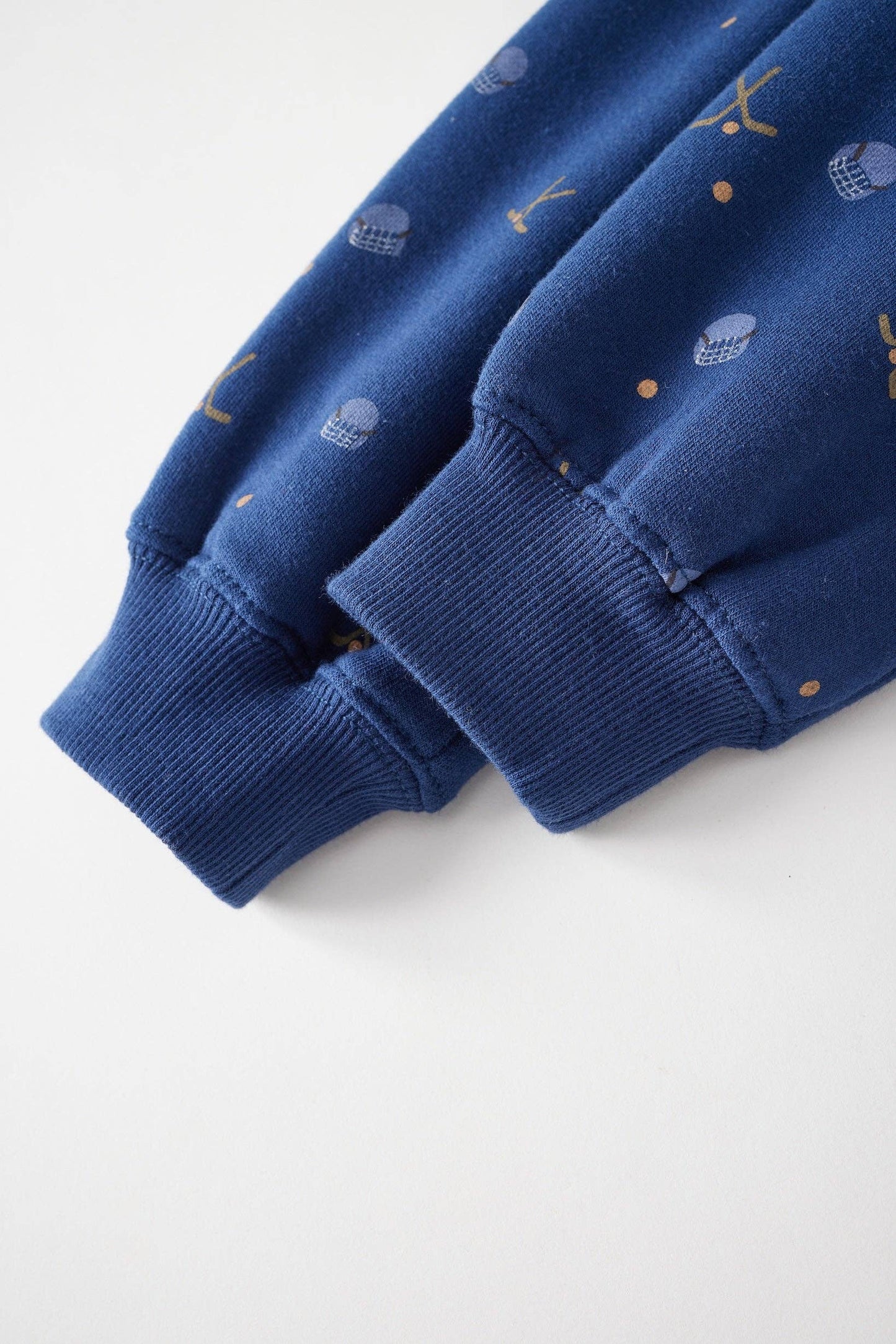 Blue sweater with pattern on a white background