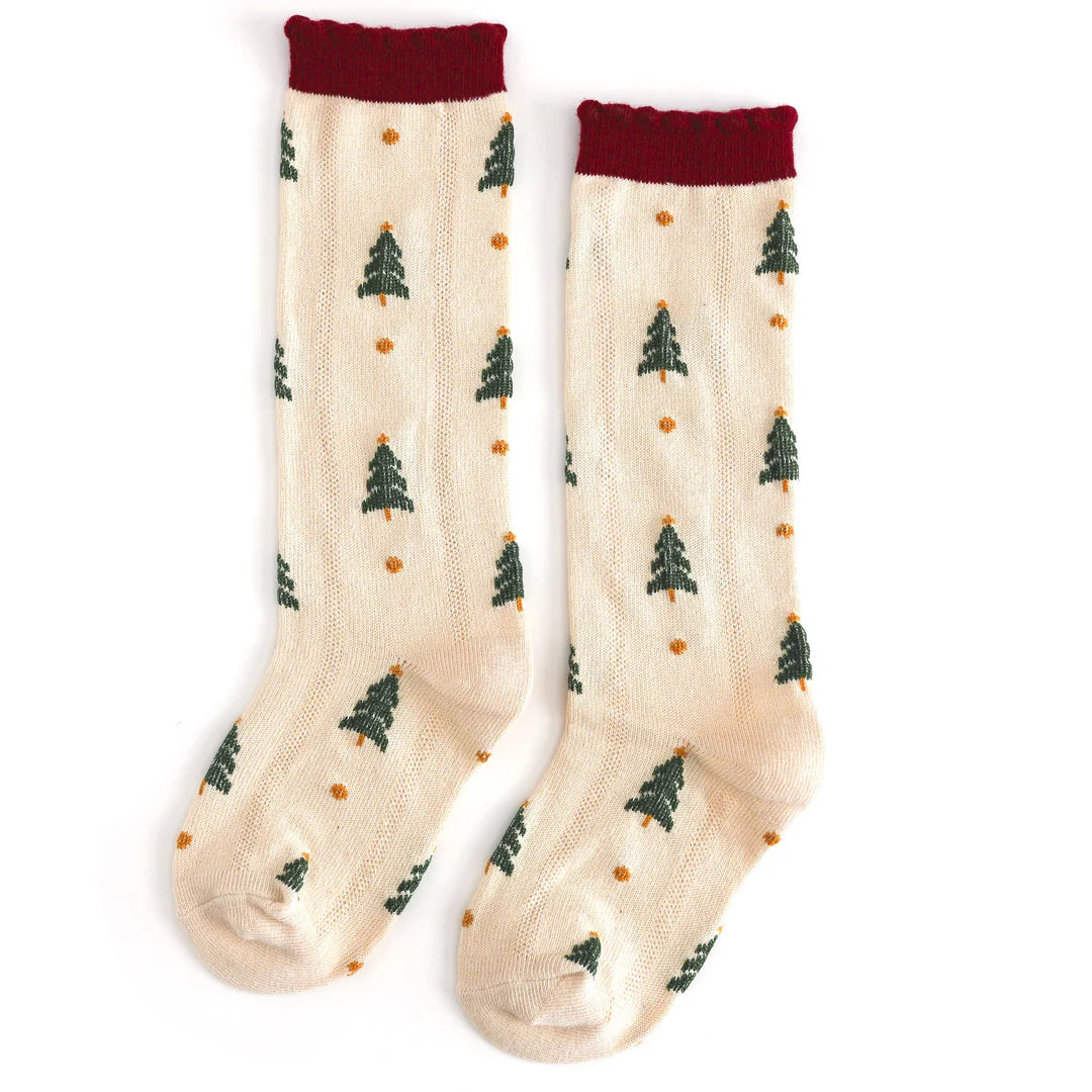 Pair of socks with Christmas tree pattern on a white background