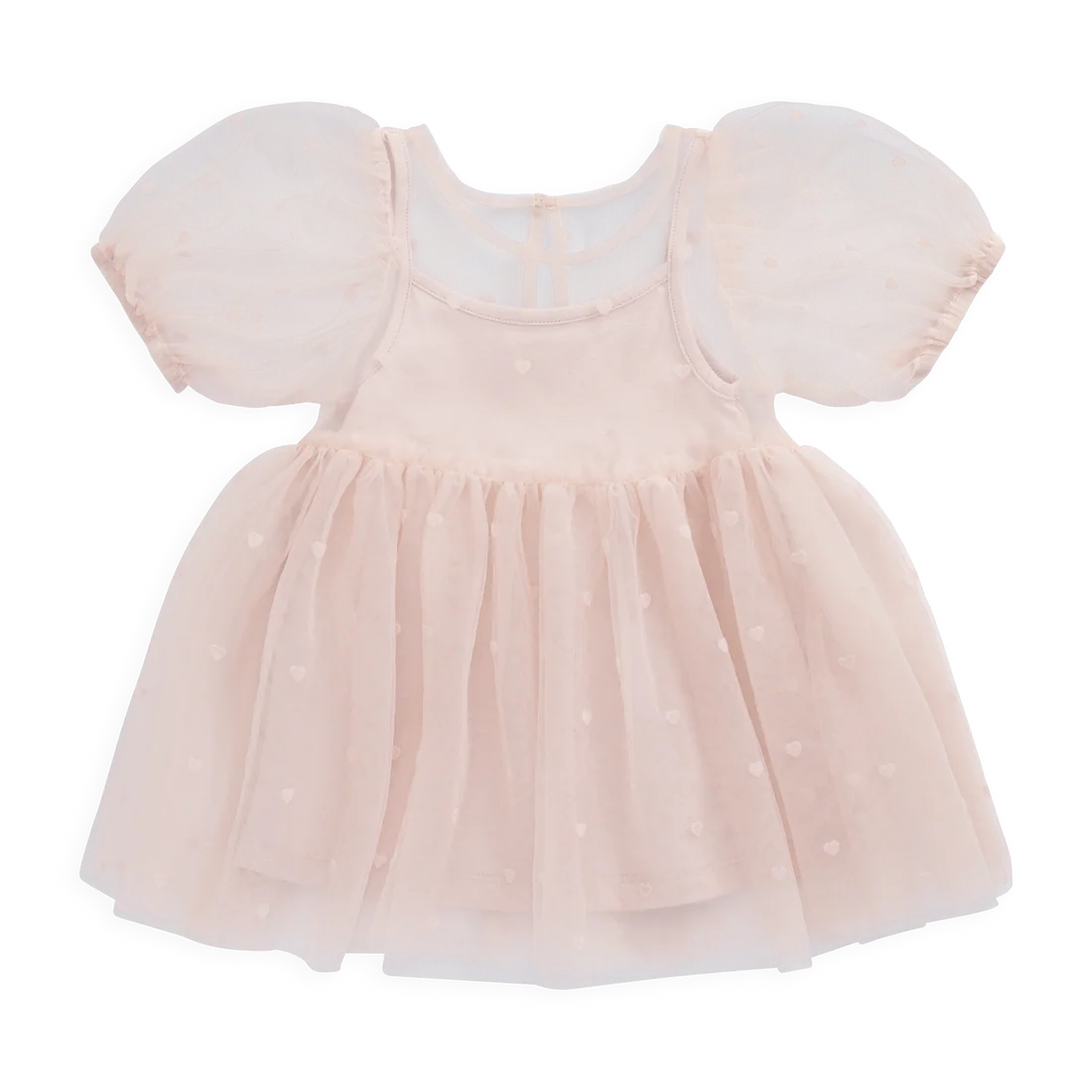 A pale blush pink toddler dress with short puff sleeves, a scoop neckline, and a layered tulle skirt with small white polka dots, shown on a plain white background.
